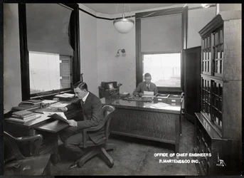 Two Men in the Office of the Chief Engineers of R. Martens und Co. Inc, New York
